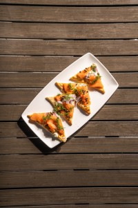 Smoked Salmon Flatbread with red onion and dill lemon cream. Part of Kona Grill's Summer Menu.